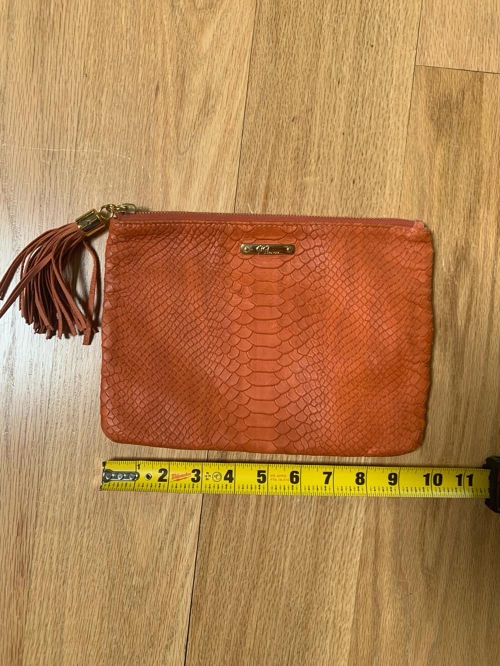 GIGI New York Orange Textured Tassel Wristlet Clutch